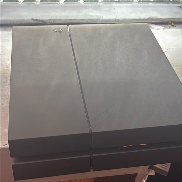 Sony Black Console with Sleek Design and Textured Finish
